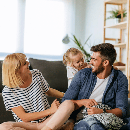 Homeowners enjoying family time inside their home